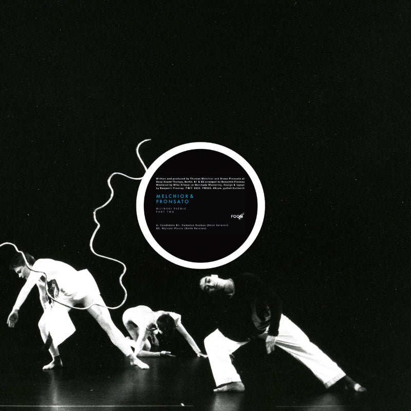 Black and white image of dancers with a circular design and text overlay on a dark background