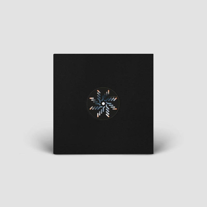 Black square with a circular design in the center on a light gray background