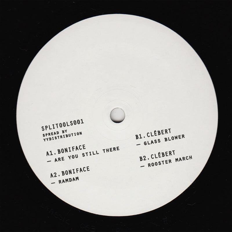 White vinyl record label with black text on a black background