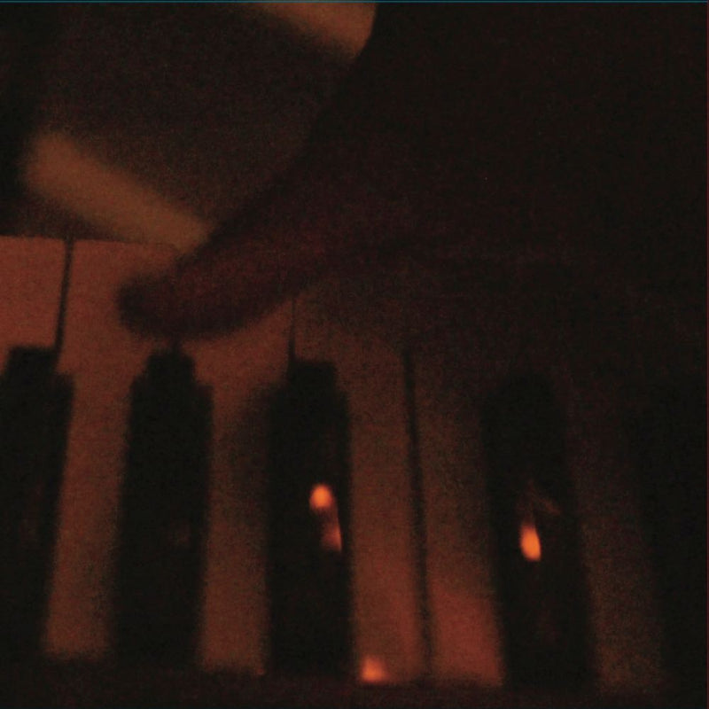 Dark silhouette of a person with a blurred background