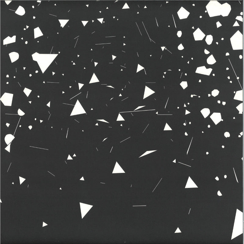 Black surface with white geometric shapes scattered across it