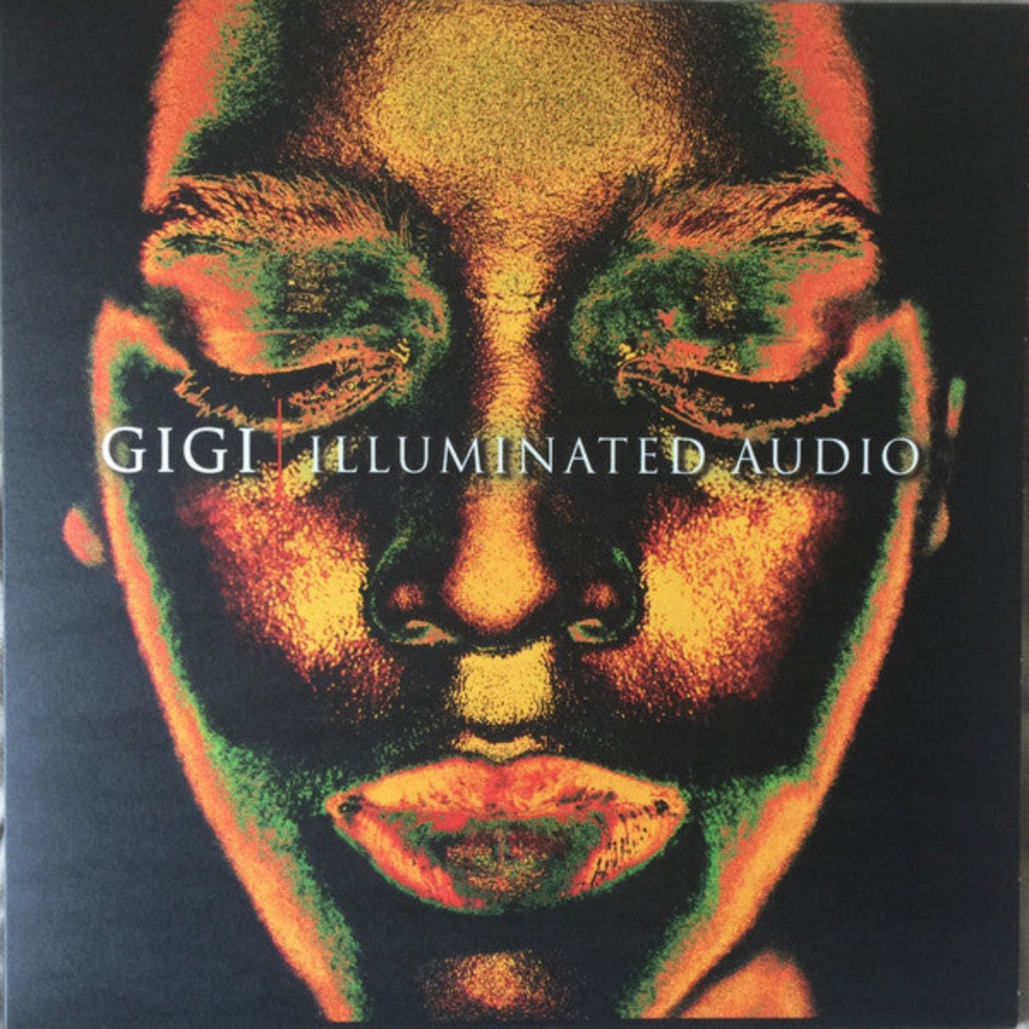 Gigi Illuminated Audio Time Capsule vinyl record front cover. A captivating image of a woman's face with vibrant, psychedelic colours. The album title and artist information are included.