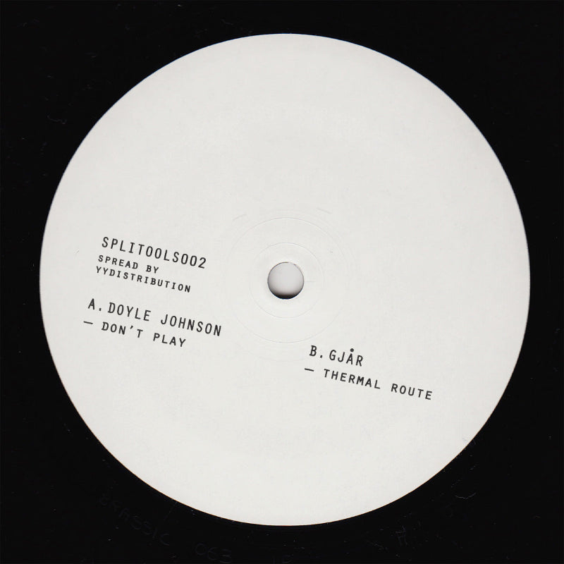 White vinyl record label with black text on a black background