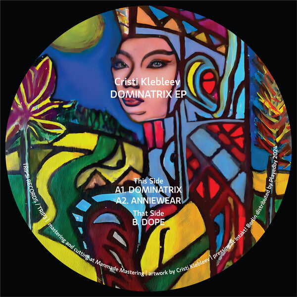 Colorful vinyl record with artistic design and text on a black background