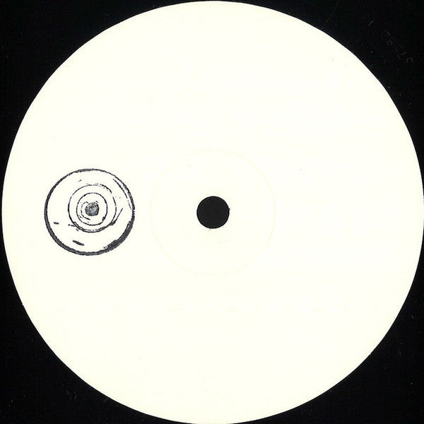 Vinyl record with a white label featuring a black dot and circular design on a black background