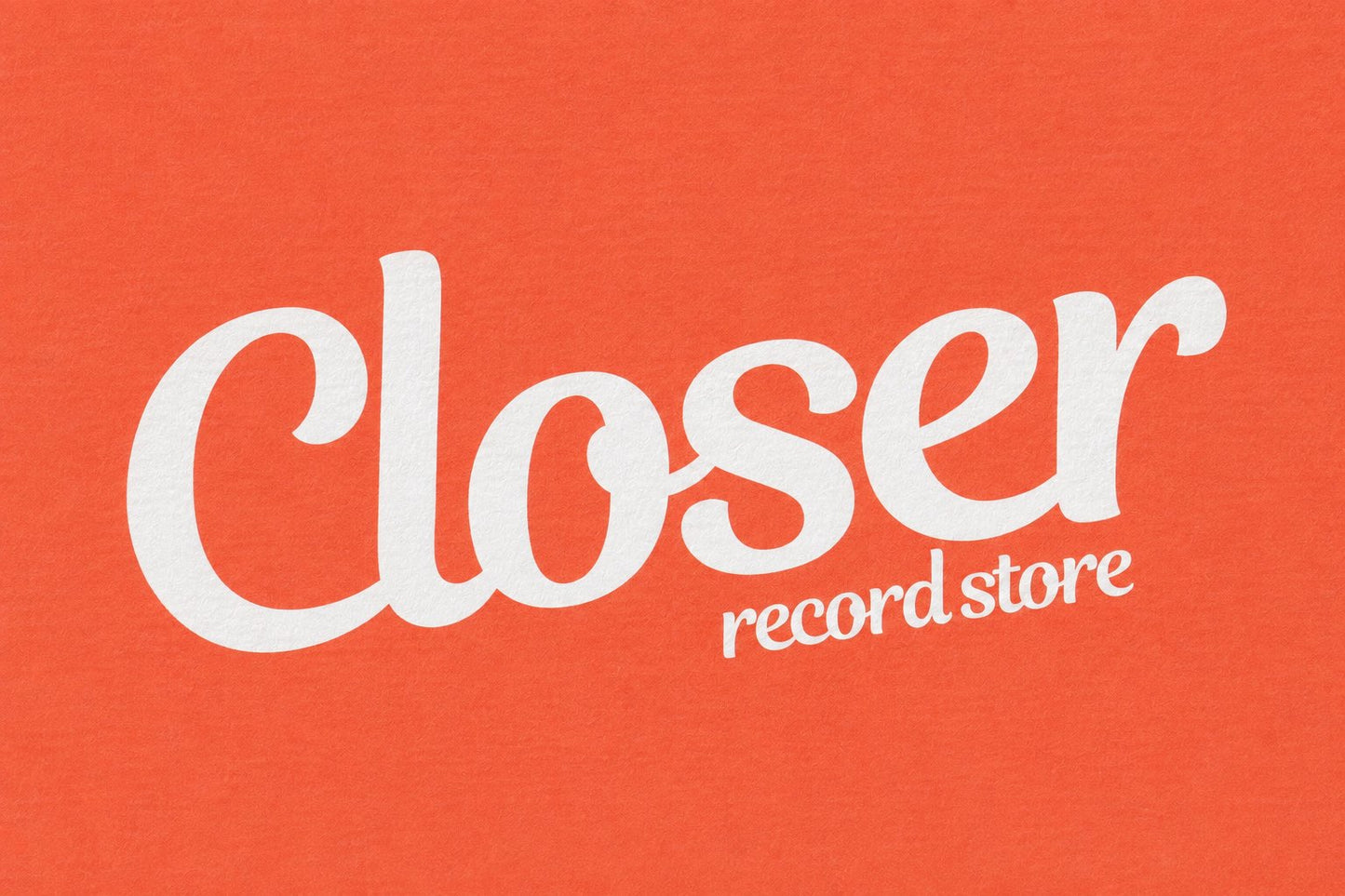 White text reading 'Closer record store' on a solid orange background.