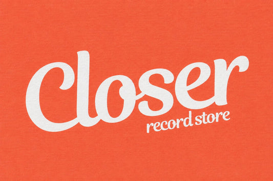 White text reading 'Closer record store' on a solid orange background.