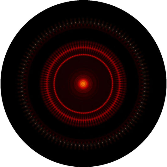 Circular object with concentric red and black rings on a white background