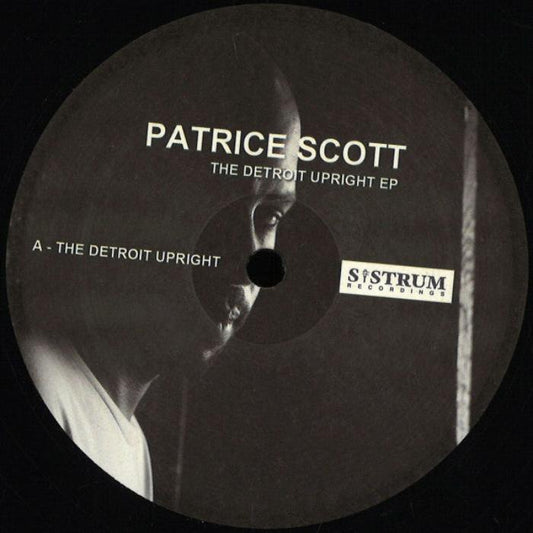 Patrice Scott The Detroit Upright EP vinyl record cover. A black and white photo of Patrice Scott's face, with the album title and artist name printed in white text.